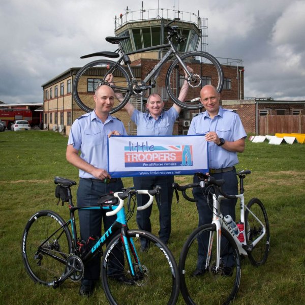 RAF Benson Air Traffic Controllers take to their bikes!
Three Air Traffic Controllers from RAF Benson are planning to cycle from their Oxfordshire base to Paris in just two days. The challenge is taking place at the end of April 2019, so they have a little over 3 weeks to prepare themselves for the 250-mile expedition.  They hope to raise £2,000 for the charity Little Troopers.
The team consists of Sqn Ldr Si Stait, FS Jon Burt-Matthews and Sgt Ian Emery who between them have 5 Little Troopers (children with parents serving in the forces). The charity Little Troopers is committed to providing support and resources to everyone involved in the care of military children.
The three cyclists have all been deployed during their children’s lifetime. Jon and Ian have been deployed to the Falkland Islands in 2014 and 2016 respectively and Si’s last detachment was to Kabul in 2018. Jon explains, “Every time I move, it’s a reminder of what all our Service families and children go through.” 
It is going to be a tough two days as they will only have 4 hours to sleep on the ferry and then it will be back on the bikes for the long cycle to Paris. The team will be supported by family and friends including Trudi Larner, the mother of an RAF airman, who is organising an afternoon tea to help the team reach their £2,000 target.
Ian’s wife, Suzanne, first heard of Little Troopers in 2016 when the charity organised football training with Chelsea Football Club.  Their son, Matthew, joined the event and really enjoyed the day as it gave him something to focus on other than Dad being away. Since then, Jon and his family have taken part in various activities with Little Troopers including the Snowdon challenge and a camping weekend last year. 
Louise Fetigan, the founder of the charity, said, “We love that families come to and enjoy our events and it’s only with their fundraising that we can keep providing things like the Little Treasures app and our separation packs that